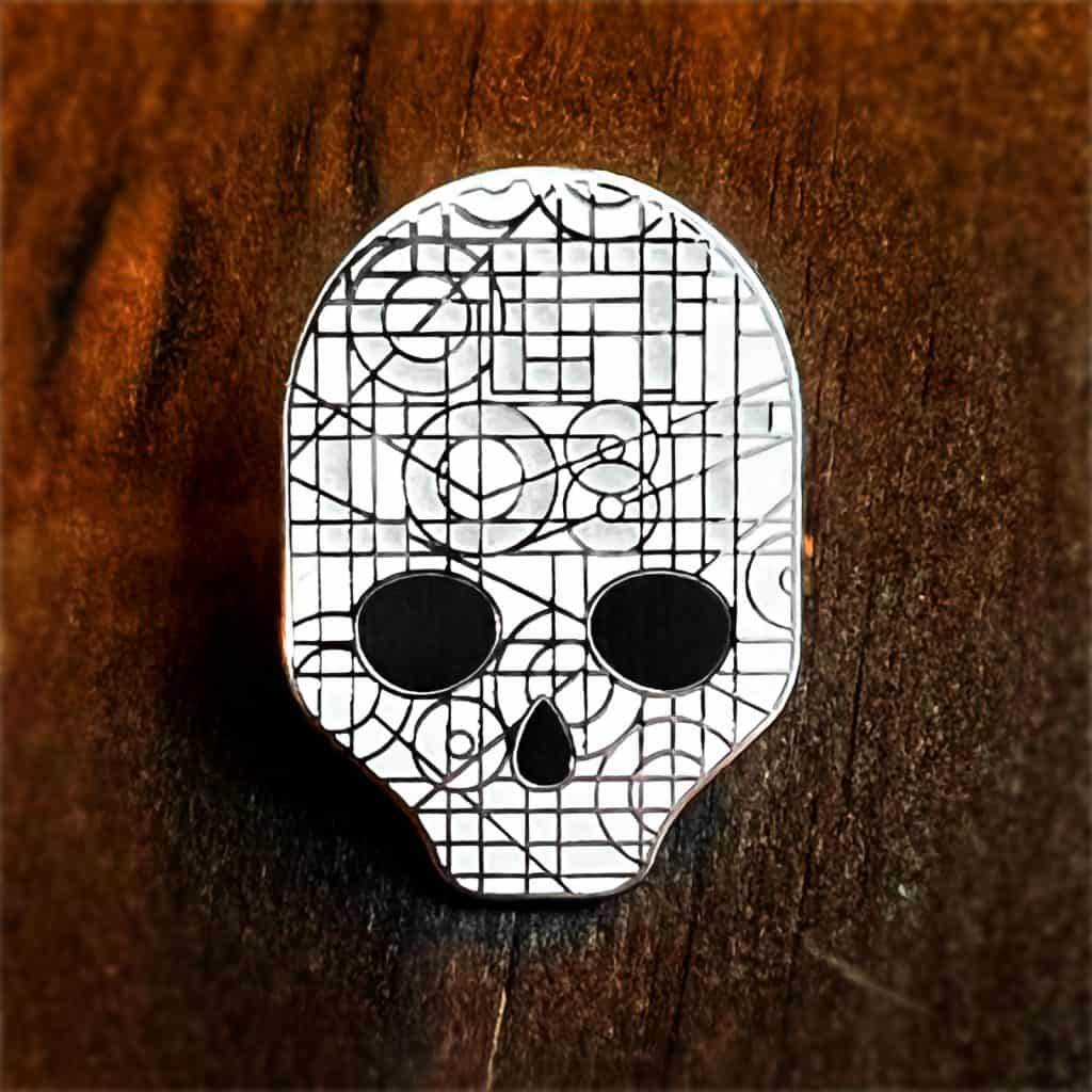 Glow in the Dark Get Lost Skull Pin from Haunts & Hollows