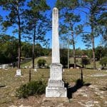 An obelisk grave marker at Lake Helen Cemetery